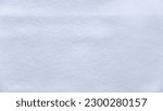 Small photo of White nonwoven fabric background and texture.