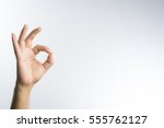 Hand ok sign on white background