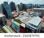 Small photo of Orchard Road, Singapore, 09-21-2023: Orchard Central has a rooftop on level twelve where a tourist can get a spectacular view of the city below with an unrestricted view of the landscape.