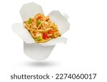 Small photo of Asian ramen noodles with shrimp, vegetables, soy sauce and spring onion scallions in white carton or cardboard takeaway delivery box. Fast delivery, street food concept in take-out box