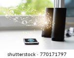 Smart phone connecting to bluetooth speaker with music lines and notes, smart life concept