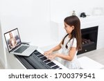 Scene of piano lessons online...