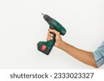 Cordless screwdriver holding by ...