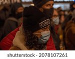 Small photo of NEW YORK, NEW YORK - NOVEMBER 19: People holding signs march in Brooklyn against the acquittal of Kyle Rittenhouse on November 19, 2021 in New York City.