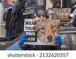 Small photo of NEW YORK, NEW YORK - MARCH 05, 2022: Animal rights activists hold a peaceful NYC's Anti-Fur Protest protesting Dior, Fendi and Louis Vuitton for refusing to go fur free.