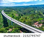 Scenic Aerial View of The Longest Active Train Bridge Cikubang and Cipularang Toll Road Viaduct, Bandung, Indonesia