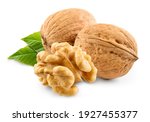 Walnut with leaf isolate. Walnuts peeled and unpeeled with leaves on white. Walnut nut side view. With clipping path. Full depth of field.