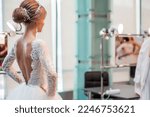 Small photo of Competition among wedding stylists. A model in a wedding dress, with hair and make-up shows the result of the stylist's work. Horizontal photo