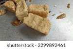 Small photo of This tofu is fresh fried tofu, where tofu is a food made from coagulated soy bean seed sediment. Tofu is found in Indonesia, Malaysia and Singapore.