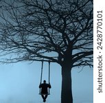 Small photo of Back view of man swinging on the wooden swing on big leafless tree. Scenic landscape. rear view of middle age unrecognisable man swinging on swing with rope under mountains.
