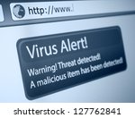 Closeup Of Virus Alert Sign In...