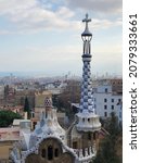 Small photo of Barcelona, Spain - November 2021: Incredible mosaic in Park Guell. Architecture and gardens of this park is the Worlds Heritage and belong to works of Antonia Gaudi. Artistic and inspirational place.
