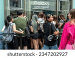 Small photo of New York NY USA-August 12, 2023 Hundreds of fans line up outside the Samsung Galaxy pop-up event in Herald Square in New York waiting for an appearance by KPop performer pH-1