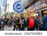 Small photo of New York NY USA-September 27, 2023 Members of SAG AFTRA and other union supporters including the United Auto Workers (UAW) picket outside the HBOAmazon offices in the Hudson Yards neighborhood