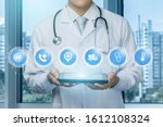 doctor shows contact icons... | Shutterstock . vector #1612108324