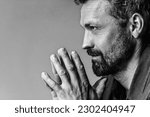 Man's brutal portrait in photo studio on white background in black and white colors. Handsome concept. High quality photo