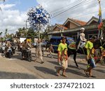 Small photo of A group of religious marchers celebrating the birthday of the Prophet Muhammad SAW in Central Java, Indonesia, 24 September 2023.