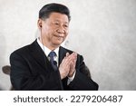 Small photo of Rome, Italy - March 22, 2019: Xi Jinping, China's president, claps his hands as he attends an Italy-China business forum with Sergio Mattarella, Italy's president, at the Quirinale Palace in Rome.