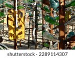 Small photo of Oro Grande, California, USA. June 14, 2014. Elmer's Bottle Tree Ranch. Eclectic Collection of Bottles and nic nacs.