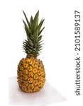 Small photo of Ripe pineapple fruit isolated on white background. Healthy and salutary vitamin food for vegetarians, vegans and simply lovers of a healthy lifestyle.