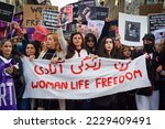 Small photo of "Women, Life, Freedom". Nearly 3000 people marched for Mahsa Amini and the hundreds of other victims murdered by Islamic Republic of Iran the past three weeks, in Brussels, Belgium on October 1, 2022.