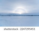 Winter arctic landscape. Snow-covered tundra. Snowy ground surface. Cold frosty winter weather. The harsh climate of the polar region. Endless arctic desert.