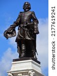 Small photo of QUEBEC CITY CANADA 08 23 20: Details of Samuel de Champlain statue as "The Father of New France" was a French navigator, cartographer, draftsman, soldier, explorer, ethnologist, diplomat, chronicler