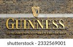 Small photo of DUBLIN REPUBLIC OF IRELAND 05 28 2023: Sign of Guinness harp is an Irish dry stout that originated in the brewery of Arthur Guinness at St. James's Gate, Dublin, Ireland, in 1759.