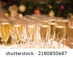 Food and drinks concept. glasses of champagne.
cold and sparkling champagne glasses. Champagne glasses on gold background. Party and holiday celebration concept. 
