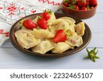 Homemade varenyky with strawberry filling - traditional ukrainian dish