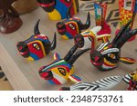 Small photo of Barranquilla, Colombia - January 4 2023: Animals mask carved in wood and painted with commemorative colors of the carnival of barranquilla colombia
