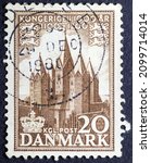 Small photo of MADRID, SPAIN - JANUARY 2, 2022. Vintage stamp printed in Denmark shows Church of Kalundborg, church of our lady, 1000th anniversary of the Kingdom of Denmark