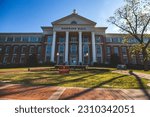 Small photo of Troy, AL, USA - March 30th, 2023: Beautiful Hawkins Hall building with garden in front at Troy University campus