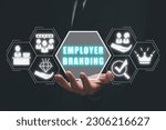 Employer branding concept, Busienssman hand holding employer branding icon on virtual screen.
