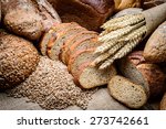 fresh bread  and wheat on the wooden