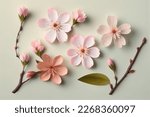 Small photo of Flowers creative composition. Bouquet of sakura cherry blossom flowers plant with leaves isolated on white background. Flat lay, top view, copy space