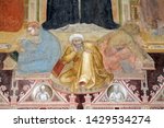 Small photo of FLORENCE, ITALY - JANUARY 10, 2019: St. Thomas Aquinas with heretics, doctors, Virtues, personifications and learned of the sciences and liberal arts, detail, Santa Maria Novella church in Florence