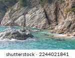 Rocky sea coast, turquoise Mediterranean sea in the winter
