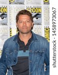 Small photo of Misha Collins attends 2019 Comic-Con International CW's "Supernatural" at Hilton Bayfront, San Diego, California on July 21 2019
