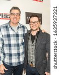 Small photo of Adam Carolla, Nate Adams attend "Uppity: The Willy T. Ribbs Story" Los Angeles Premiere at Petersen Museum, CA on February 4 2020