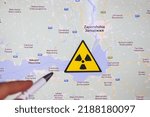 Small photo of Kyiv, Ukraine - 2022 august 8: Zaporizhzhia nuclear power plant on map. The danger of nuclear leak and radiation. Russian forces occupying nuclear power plant