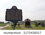 Small photo of Gettysburg, PA United States - July 21, 2021: A heritage memorial sign marks the site of the beginning of the Battle of Gettysburg on July 1, 1863, remembering Union cavalry and Confederate soldiers.