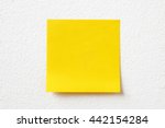 blank crumpled sticky note paper on texture wall as concept