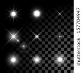 set of vector glowing light... | Shutterstock .eps vector #157704947
