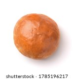 Top view of fresh baked wheat bun isolated on white 