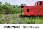 Abandoned Red Train Caboose In...
