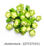 Small photo of Chopped okra isolated on white background.Heap of chopped ladies finger.Okra or Bhindi slices.Chopped lady finger pieces or slices.Top view.