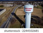 Small photo of Hampstead, MD, USA - 12-27-2022: An overhead shot of Hampstead, Maryland featuring a water tower