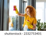 Small photo of In a sunlit room, a red-haired woman meticulously cleans windows. Her focused expression and diligent movements reveal her commitment to perfection, capturing the essence of cleanliness and clarity