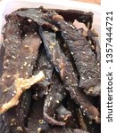 Small photo of Thai sun dried beefs mix sesame seeds, Coriander seeds, Black Peppers, Garlics, Oyster sauce, Thin soy sauce, sugar, unsweetened condensed milk.